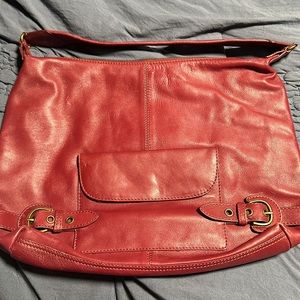 Wilson’s leather cranberry handbag